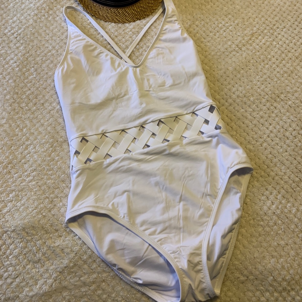 Womans white one piece swimsuit